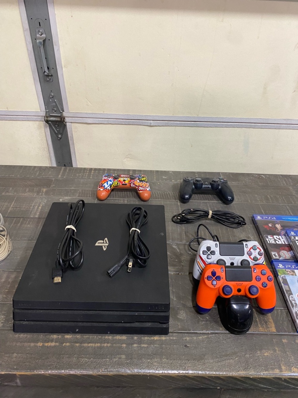 Sony PlayStation 4 Pro Black Console with 4 Controllers and charging dock